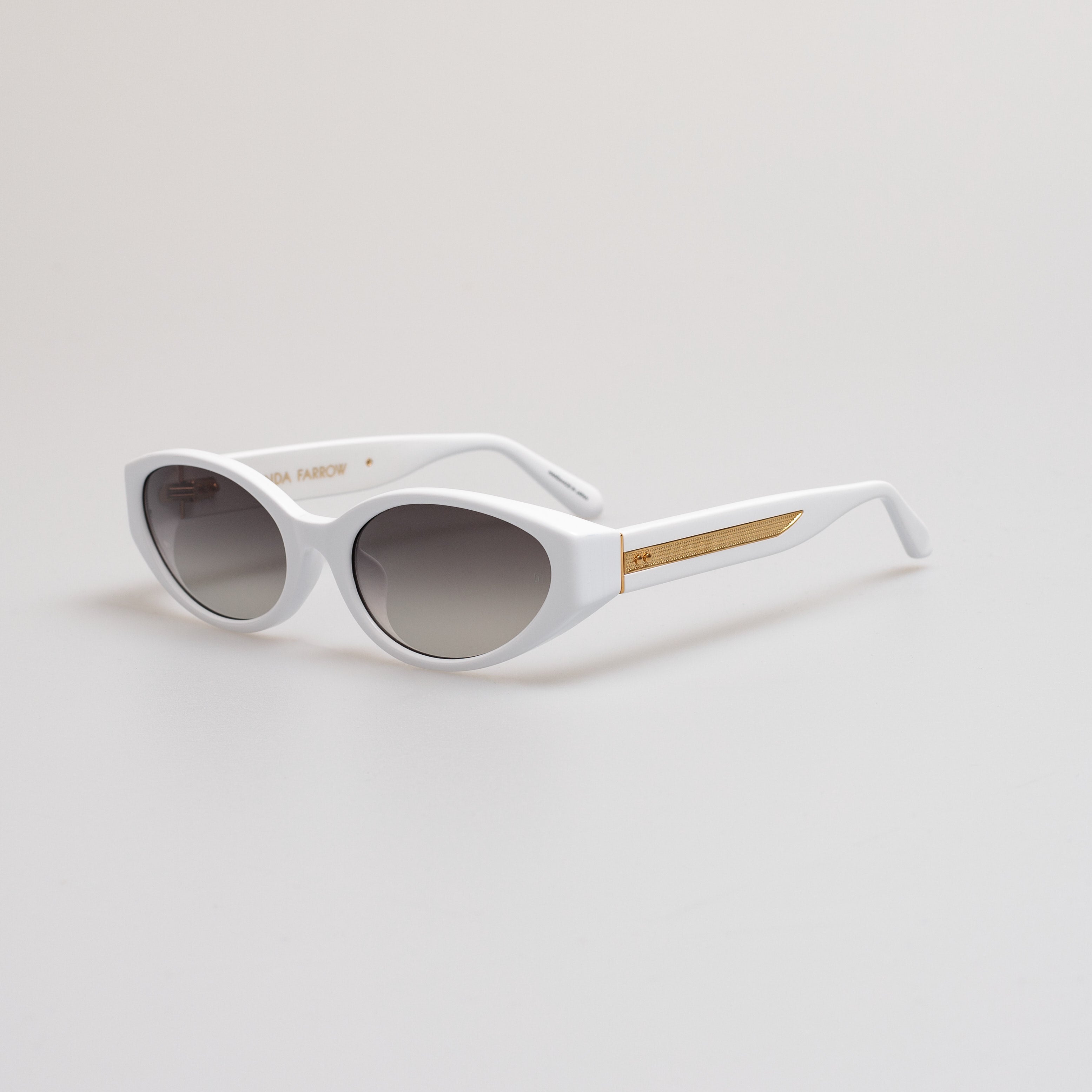 Lyra Oval Sunglasses in White
